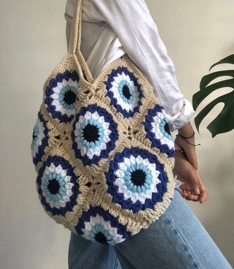 Crochet bag granny square #crochetbaggrannysquare #crochet #crochetbag #crochetbags 18.1 Evil Eye Granny Square Bag, Evil Eye Crochet Bag Pattern, Mamma Mia Crochet, Evil Eye Granny Square Pattern, Evil Eye Crochet Pattern Free, Greek Crochet, Evil Eye Granny Square, Evil Eye Crochet Bag, Crochet Bag Diy