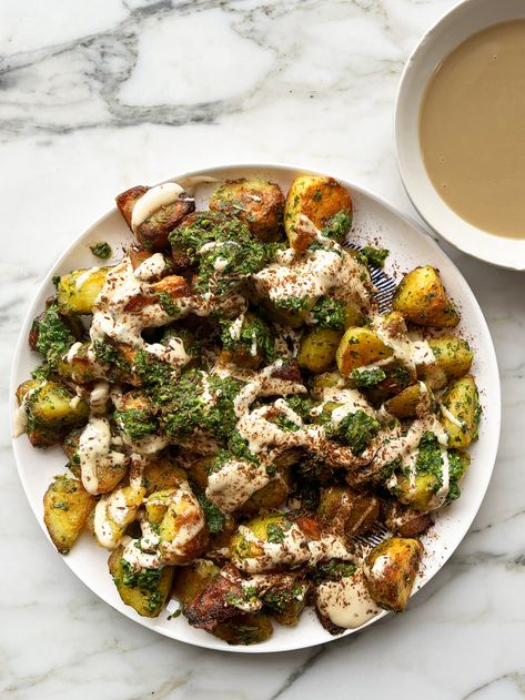 Roast potatoes with green sauce and tahini | Ottolenghi Recipes Mezze Recipes, Classic Roast, Ottolenghi Recipes, Tahini Recipe, Desserts With Biscuits, Yotam Ottolenghi, Roast Potatoes, Green Sauce, Party Food And Drinks