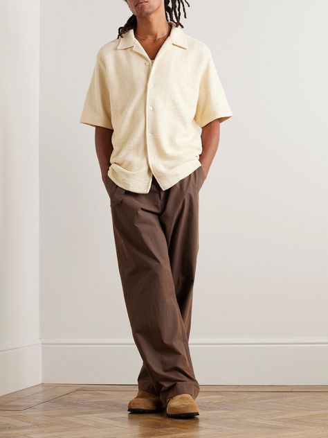 NN07's 'Julio 3520' shirt is reminiscent of vintage bowling uniforms, it's even embroidered at the chest. It's made from a cotton-blend that's subtly striped with bouclé. Balance out the proportions by layering it over a ribbed tank top. Brown Cream Outfit Men, Men’s Timeless Fashion, Melbourne Mens Fashion, Comfortable Mens Outfits, Bowling Shirt Outfit Men, Bowling Shirt Outfit, Mens Tank Top Outfits, Men’s Summer Casual Outfits, Men’s Summer Fashion 2024