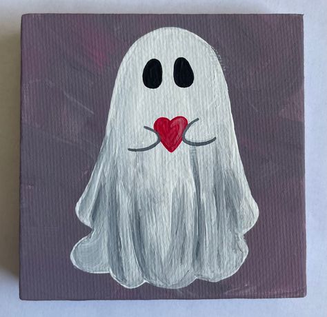 "3\"x3\" Hand Painted Halloween Ghost with heart Canvas Painting This small ghost painting is the perfect addition to your fall/Halloween decor.  Hand painted on a 3\"x3\" canvas with acrylic paint, each painting is one of a kind.  A great gift for a friend or family member or perfect just for you!" Easy Paintings Halloween, Small Painting Ideas Mini Canvas Simple, Simple Heart Painting, Simple Ghost Painting, Mini Halloween Paintings, Halloween Paint Night Ideas, Simple Painting Ideas Acrylics, Little Ghost Painting, Simple Halloween Paintings