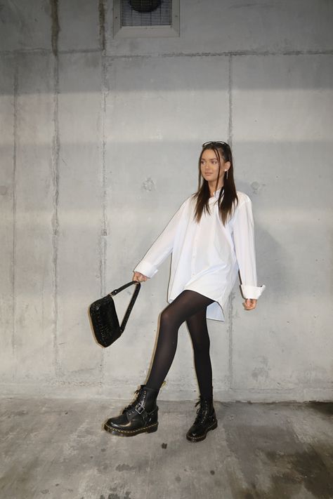 leg poses, instagram poses, posing ideas, white shirt dress, white shirt outfit, doc martens outfit, tights outfit ideas, instagrammer #instagramtips #instagram #ootd #ootdfashion #pinterest #docmartensoutfits #carpark #instagrampostideas White Shirt And Tights Outfit, White Dress With Doc Martens, Car Park Photoshoot, Tights Outfit Ideas, White Socks Outfit, White Shirt Outfit, Doc Martens Outfits, Park Photoshoot, Martens Outfit