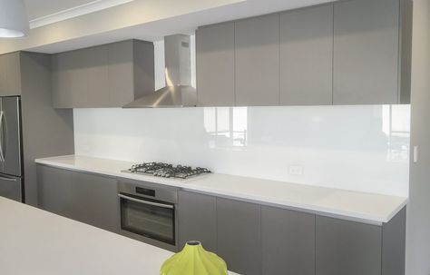 White Glass Kitchen Backsplash, Glass Backsplash Kitchen Dark Cabinets, White Glass Splashback Kitchen, White Splashback Kitchen, Kitchen Splashback Ideas Glass Modern, Oven Splashback, Ikea Kitchen Australia, White Glass Backsplash, Kitchen Splashback Designs