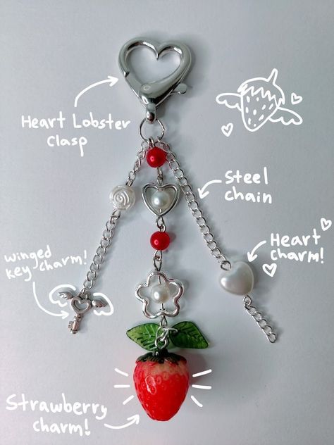 This is a keychain with a strawberry charm, made of stainless steel chain, imitation pearl beads, and resin and metal charms! Some charms include a winged heart key and imitation pearl heart! This keychain is homemade and made and packaged with care! Keychains With Charms, Strawberry Beaded Keychain, Bead Bag Charm, Wire Keychain Diy, Beaded Bag Charm, Keychain Beads Ideas, Homemade Keychains, Gummy Bear Keychain, Valentine Keychain