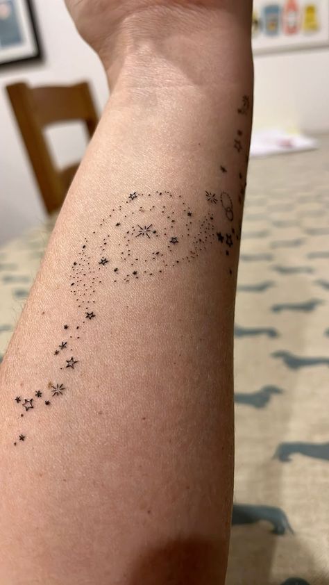 Stars And Sky Tattoo, Cloud Moon Stars Tattoo, Dainty Galaxy Tattoo, Star Dust Tattoo Design, Whimsical Wrist Tattoo, Galaxy Filler Tattoo, Space And Stars Tattoo, Milky Way Tattoos, Galaxy Spine Tattoo