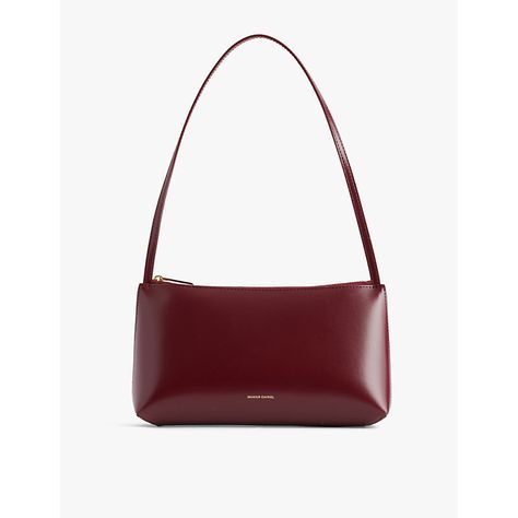 Find MANSUR GAVRIEL Gaia Leather Shoulder Bag on Editorialist. The Mansur Gavriel Gaia leather shoulder bag is crafted from 100% calf leather and features a zip fastening. It has a structured shape, top handle, and gold-toned hardware. The bag measures 13cm in height, 25cm in width, and 5.5cm in depth, with a handle drop of 25cm. This bag is made in Italy and comes with a dust bag. It can be worn on the shoulder and is perfect for everyday use. Build Wardrobe, Mansur Gavriel Bag, Printed Leather Bag, Text Print, Gold Bag, Luxury Bag, Mansur Gavriel, Leather Cleaning, In Depth