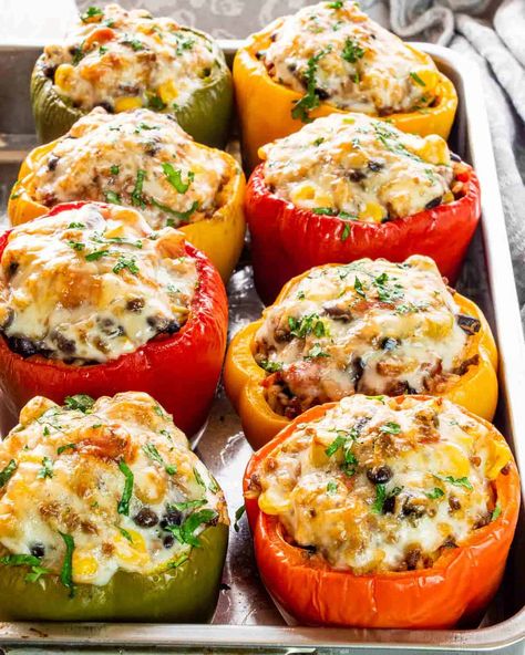 These easy Southwestern Style Stuffed Peppers are sure to be a hit in your home! Stuffed peppers are the perfect make-ahead one pan weeknight meal that your family will love! #stuffedpeppers #southwesternfood #recipes Southern Style Stuffed Bell Peppers, Southwestern Stuffed Bell Peppers, Mexican Style Stuffed Peppers, Southwest Stuffed Bell Peppers, Stuffed Pepper Recipes, Southwest Stuffed Peppers, Air Fryer Dinners, Stuffed Peppers Beef, Mexican Stuffed Peppers