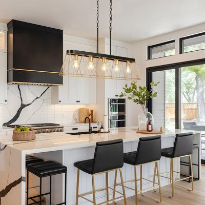 This five-light kitchen island pendant lamp is made of sturdy iron and features a contrasting finish in deep gold and matte black, which not only enhances its rust and corrosion resistance but also ensures durability and long-term aesthetic appeal. Its simple and elegant design incorporates an open metal framework that stabilizes the structure while allowing light to freely penetrate, effectively enhancing the spatial layering and visual impact to create a warm atmosphere. Whether in an industri Rectangle Kitchen Island, Kitchen Island Lighting Black, Kitchen Island Square, Lights Over Island, Rectangle Kitchen, Modern Contemporary Kitchen, Modern Kitchen Decor, Kitchen Island Pendant, Kitchen Decor Modern