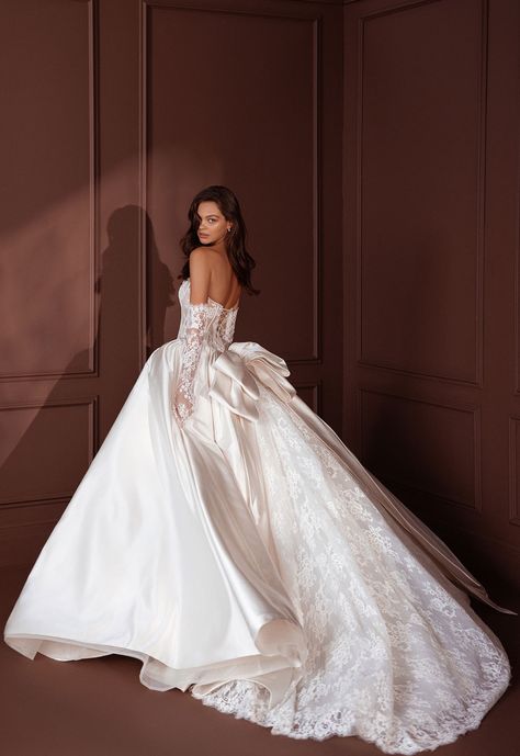 Pnina Tornai 2024 Couture Collection: Utopia | Strapless ballgown with sheer Alençon lace bodice, satin skirt with lace inset train, large satin bow, and pearl trim. Shown with matching Alençon lace gloves with pearl trim sold separately. | couture wedding dress, bridal gown, say yes to the dress, Kleinfeld, luxury wedding dress, wedding outfit, women's fashion, wedding ideas, wedding dresses inspiration, wedding dresses trendy, red carpet dress, dresses, luxury fashion, couture fashion, lace wedding dress, bridal accessories, strapless wedding dress, ballgown wedding dress, satin wedding dress, wedding trends, corset wedding dress Wedding Dress With Gloves, Pnina Tornai Wedding Dress, Big Wedding Dresses, Dress With Gloves, Couture Bridal Gowns, Cathedral Train, Pnina Tornai, Kleinfeld Bridal, Pretty Wedding Dresses