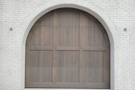 Rounded Garage Doors, Arched Garage Doors Opening, Tudor Garage Doors, Arch Garage Doors, Arched Garage Doors, Garage Doors Wood, Tudor Design, Custom Wood Garage Doors, Carriage House Garage Doors