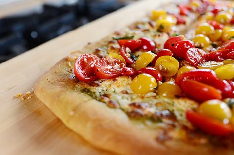 :)  A Bruschetta - pesto- 4 cheese- yellow and grape tomatoes- basil - balsamic vinegar- garlic Pizza !  by Ree Drummond / The Pioneer Woman Bruschetta Pizza, Four Cheese Pizza, Basil Pizza, Pioneer Women Cooks, Pioneer Woman Recipes, Ree Drummond, Just Bake, Pizza Recipes Dough, Pizza Stone