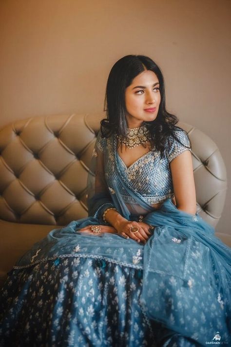 Photo of engagement lehenga in blue with light jewellery Light Blue Lehenga, Monsoon Wedding, Bun With Curls, Engagement Lehenga, Lehenga Jewellery, Light Jewelry, Blue Lehenga, Indian Wedding Planning, Bride Sister