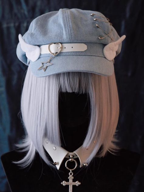 Elevate your accessory game with our handmade heart buckle and wings light blue denim hat. This adorable hat features a unique handmade heart buckle and wings, adding a touch of whimsy to your look. The light blue denim gives it a fresh and casual vibe, perfect for everyday wear. Complete with a star charm and pins for added flair, this hat is a statement piece that will surely turn heads.   Please note that this product includes only the hat. Blue Headpiece, Cool Hair Designs, Hair Inspiration Long, Steampunk Fashion Male, Denim Hat, Gothic Accessories, Kawaii Fashion Outfits, Handmade Heart, Light Blue Denim