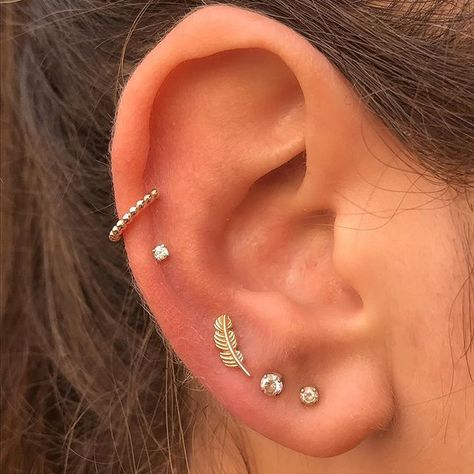 Healed double mid helix by myself @love_hatelondon last year with @bvla jewelry, and reopened lobes with @bvla feather and @neometaljewelry prongset CZs ✨ Ušný Piercing, Ear Piercing For Women, Mens Piercings, Different Types Of Piercings, Unique Piercings, Piercing Snug, Guys Ear Piercings, Piercing Orbital, Ear Peircings