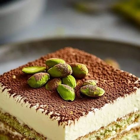 Chef zouheir on Instagram: "🍴 Pistachio Tiramisu Recipe

Ingredients:

For the Pistachio Sponge Cake:

1 cup all-purpose flour
1/2 cup ground pistachios
1 teaspoon baking powder
1/4 teaspoon salt
4 large eggs, separated
3/4 cup granulated sugar

For the Mascarpone Cream:

1 1/2 cups mascarpone cheese
1 cup heavy cream
1/2 cup powdered sugar
1 teaspoon vanilla extract

For the Assembly:

1/2 cup brewed espresso, cooled
1/4 cup coffee liqueur
1/2 cup chopped pistachios, for garnish
Cocoa powder, for dusting

Directions:

Prepare the Sponge Cake:

Preheat your oven to 350°F (175°C).
Line a 9x13-inch baking dish with parchment paper.
In a bowl, mix flour, ground pistachios, baking powder, and salt.
Beat egg yolks with half the sugar until fluffy. In another bowl, beat egg whites until soft pe Pistachio Tiramisu Recipe, Pistachio Tiramisu, Lavender Shortbread Cookies, Chocolate Deserts, Pistachio Recipes, Ganache Recipe, Shortbread Cookie Recipe, Tiramisu Recipe, Dessert Salads