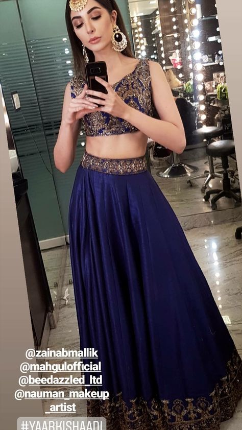 Navy blue lengha with a crop top Navy Blue Lehenga Makeup Look, Navy Blue Lehenga Simple, Blue Lehenga Jewellery Ideas, Royal Blue Lehenga Color Combinations, Navy Blue Lengha, Lehenga Jewellery Ideas, Lengha Ideas, Blue Lengha, Lehenga Simple