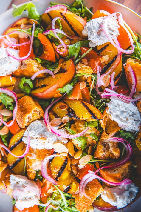 If you want a salad to impress this summer, this is it! It’s packed with grilled peaches, crunchy garlic croutons, quick pickled red onions, rocket, tomatoes, basil and vegan soft cheese with an incredible tomato dressing. It’s absolutely amazing. Make it for lunch, dinner or as a side for a summer BBQ or spread. Your vegan guests will adore it, but so will the veggies! 🍑 CLICK THROUGH FOR THE RECIPE ⭐️ Peach Salad Recipes, Tomato Dressing, Crunchy Garlic, Garlic Croutons, Quick Pickled Red Onions, Vegan Peach, Quick Pickled Onions, Quick Pickled, Panzanella Salad