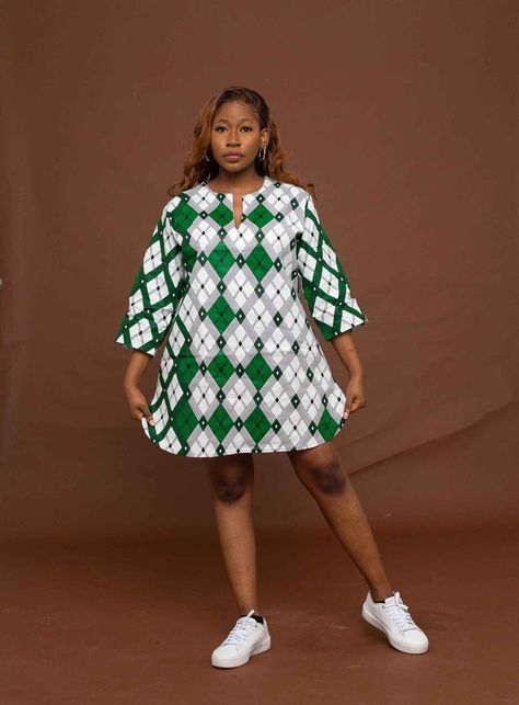 * Loose fit ankara Tunic dress, made to suit different body types. * ***Ready to ship, will be dispatched 1 to 3 days after order your has been placed. * Rush service also available; please send us an email.   CARE INSTRUCTIONS * Hand wash with warm water. * Do not bleach. * Allow to air dry. * Press with cool iron on wrong side. Ankara Tunic Tops, Ankara Shift Dress With Sneakers, Free Ankara Dresses, Ankara Dress Styles For Work, Loose Ankara Dress Styles, Ankara Free Dresses, Ankara Shirt Dress For Women, Maternity Ankara Dresses, Ankara Shirt Dress Styles