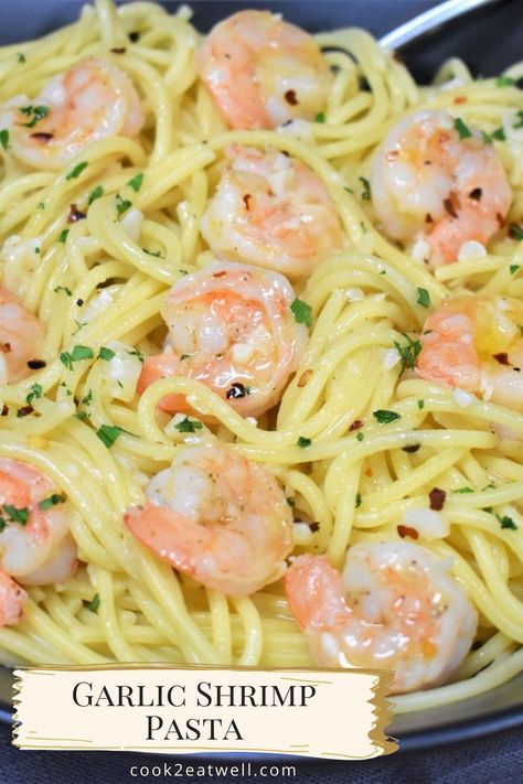 A close up image of the garlic shrimp pasta garnished with chopped parsley. There is a small, gold and off-white banner on the bottom left with the title in black letters. Shrimp Broccoli Pasta, Garlic Oil Pasta, Seafood Pasta White Wine, Shrimp Noodles Recipes, Garlic Shrimp Pasta Recipes, White Wine Pasta Sauce, Garlic Butter Noodles, Shrimp Pasta Recipes Easy, Cooked Shrimp Recipes