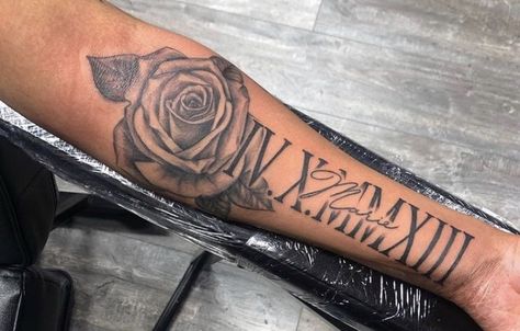 Low Sleeve Tattoos For Women, Roman Numeral Tattoo Men Arm Half Sleeves, Ezekiel Tattoo Name, Rip Arm Tattoos For Women, Mom Name Tattoo For Men Forearm, Forarm Tattoos Mens Creative, Mum And Dad Tattoos Men, Mens Thigh Tattoos Ideas, Roman Numeral Tattoo Men Forearm