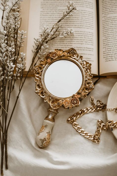 Mirror Lying on Open Book · Free Stock Photo Fragrance Oil, Fragrance, Mirror, On Twitter, Glass, Twitter, Flowers