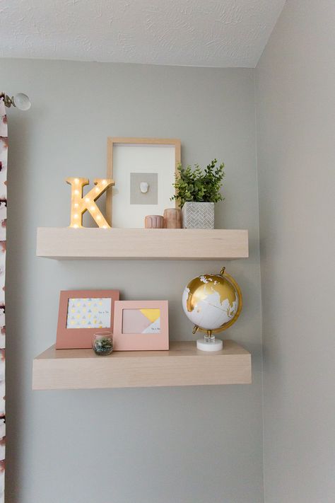 Floating shelves. Pink accessories. Teen girl's room. Fluff Interior Design - Decorating for REAL life! Omaha, NE. Teenage Shelf Decor, Teen Bedroom Floating Shelves, Floating Shelves Bedroom For Bags, Floating Shelves Teen Bedroom, Preppy Floating Shelves, Cute Shelves For Bedroom, Floating Shelves In Kids Room, Cute Shelf Ideas Bedrooms, Floating Shelves Teen Girl Bedroom