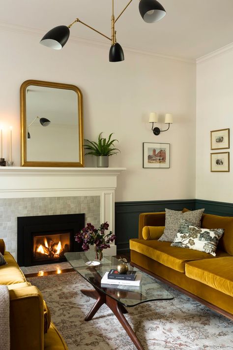 Blending Modern And Traditional Decor, Mid Century Modern Sconces Living Room, Neutral Living Room With Jewel Tone Accents, Mid Century Antique Living Room, Fireplace Decor Mid Century Modern, Victorian And Mid Century Modern, Classical Modern Living Room, Fireplace Midcentury Modern, 1920s Inspired Living Room