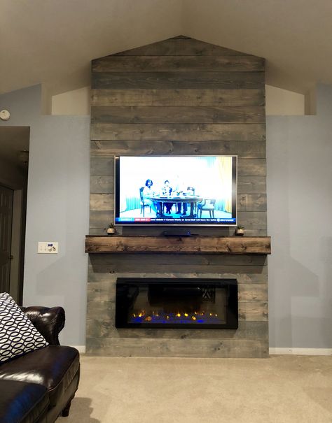 Weathered Grey rustic farmhouse style fireplace wall. Vaulted ceiling, electric fireplace, floating mantle, tv above fireplace. #thedeckerator Fireplace Wall Vaulted Ceiling, Farmhouse Style Fireplace, Above Fireplace Ideas, Tv Above Fireplace, Tv Over Fireplace, Electric Fireplace Wall, Style Fireplace, Fireplace Tv Wall, Farmhouse Room