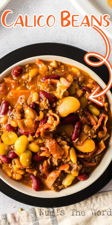 Have you ever dived into a bowl of Crock Pot Calico Beans and found yourself in comfort food heaven? Well, that’s exactly what you’re going to eat! #numstheword #crockpotcalicobeans #calicobeans #calicobeansrecipe #calicobeanrecipe #calicobean #calicobeandish #calicobeanscrockpot #calicobeansslowcooker #crockpotcalicobeans #calicobeansrecipecrockpot #calicobeansincrockpot #calicobeansrecipecrockpot #calicobeansslowcooker #slowcookercalicobeans #calicobeansinslowcooker Calico Beans Recipe Slow Cooker, Calypso Beans Recipes, Calico Beans Crockpot, Calico Bean Soup Recipe, Beans Dishes, Calico Beans Recipe, Calico Beans, Picnic Recipes, Sides Recipes