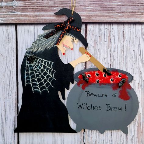 Handpainted Witch's Cauldron Filled With Eyeball Brew. Wooden Hangar Sign.....Spooooook-Tacular!!! *** Price Firm Due To Material Cost, Time & Effort Spent, And 30% Posh Fees*** This Item Doesn't Qualify For Any Of My Sales. Thank You In Advance For Your Understanding Smoke-Free Home With Dogs Wooden Witch Crafts, Witch And Cauldron Painting, Dollar Tree Wooden Witch And Cauldron, Dollar Tree Wood Witch And Cauldron, Witch Cutout, Witch And Cauldron, Witch With Cauldron, Witch Door Hanger, Holiday Paintings