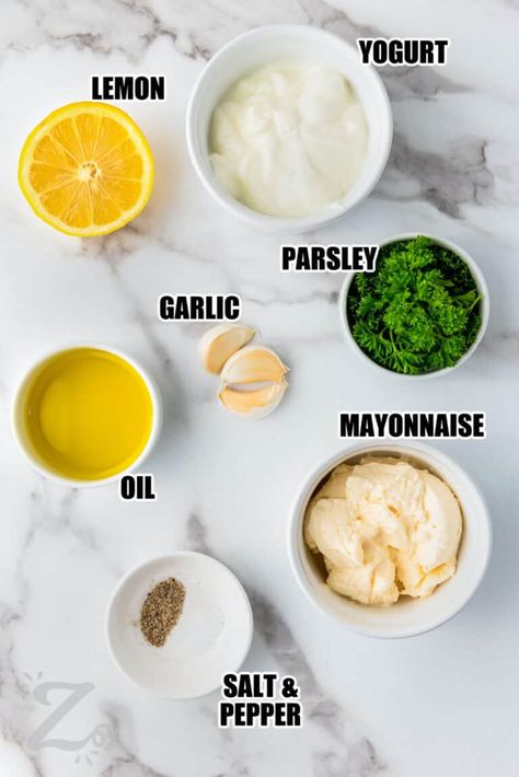 For a versatile go-to dip or dressing that tastes great on salads, bread, and vegetables, try this easy garlic sauce recipe. This Papa Johns copycat is made in just five minutes by blending fresh garlic cloves with mayonnaise, yogurt, lemon juice, olive oil, and herbs. Use it as a dip for pizza crust, but don’t stop there! Rich and tangy garlic sauce tastes amazing on vegetables and sandwiches or as a dip for chips or pretzels. #garlicsauce #garlicsaucerecipe #ourzestylife #garlicsauceforpizza Olive Oil Garlic Sauce, Garlic Sauce For Pizza, Slow Cooker Pasta Recipes, Easy Truffles, Garlic Sauce Recipe, Bread Sauce, Homemade Garlic Bread, Aioli Recipe, Garlic Dip