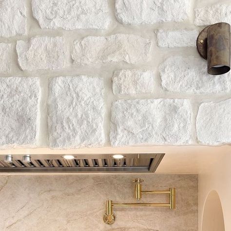 Eldorado Stone on Instagram: "What's for dinner? Does it matter when you're staring at this gorgeous white stone, stainless and brass combo?  Pictured: Loire Valley RoughCut w/ Whitewash Overgrout Technique" Casa Blanca Eldorado Stone, Eldorado Stone, What's For Dinner, Loire Valley, White Stone, White Wash, House Exterior, Matter, Exterior