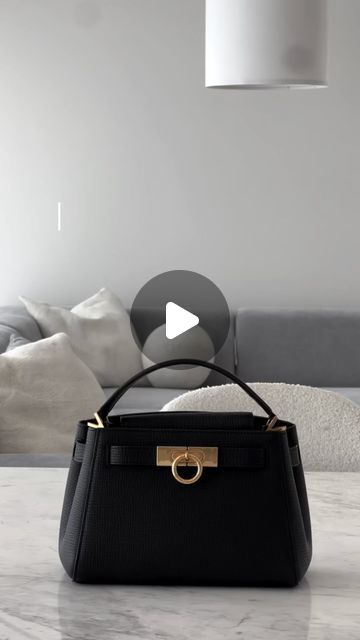 Parisa Wang New York on Instagram: "Stylish, chic & practical🖤

Our Madison Micro Top Handle Bag is the perfect addition to your A/W collection. Wear it open or fully buckled for an effortlessly versatile look.

Discover the collection online.

 cc @allvynguyen
-

#parisawangny #luxuryhandbag #luxuryhandbags #luxurystyling #luxurybags #designerstyle #LuxuryLifestyle #luxurystyle #luxurybag #nycfashion" Parisa Wang, Nyc Fashion, Handle Bag, Luxury Handbags, Luxury Lifestyle, The Collection, Top Handle, Luxury Bags, Top Handle Bag