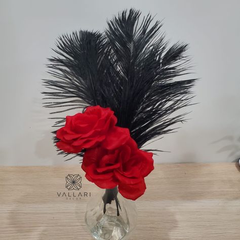 This centerpiece is the perfect addition to your Hollywood or Great Gatsby themed party! For Tables! I can also do this for other size vases. Let me know what you are looking for in the personalization section at checkout! This centerpiece will include:  1- Small Bud Vase  3 pc 12-14" Feathers (can choose Color of feathers from the drop down list) 2pc Roses stems You can always Mix and Match!  Note: These will need to be assembled! Contact me if you have any questions! :) Visit Our Etsy Page for Black White And Red Centerpieces, Harlem Nights Theme Centerpieces, Masquerade Flower Centerpieces, Hollywood Table Centerpieces, Mascarade Party Decor, Black Tie Party Decorations, Red And Black Centerpieces, Gatsby Centerpiece Ideas, The Great Gatsby Party Theme