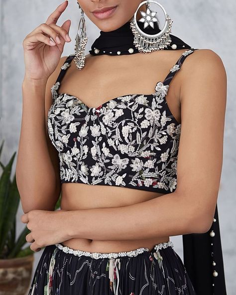 P R I N T S // SERENA SS'19 Our embroidered bustier blouse & printed lehenga define contemporary occasion dressing! --- 🌸Shop at our… Bustier Blouse, Mahima Mahajan, Embroidered Bustier, Black One Shoulder Top, Printed Lehenga, Hand Woven Textiles, Black Corset, One Shoulder Tops, Black Ruffle