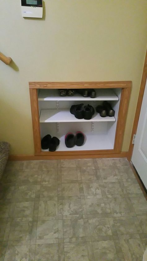 Split Level Shoe Storage Shelf built in to wall to provide shoe storage for small split entry, using 2x4s, 1/4 inch plywood,  and channel lock shelving. Split Entry Remodel, Shoe Storage Small, Split Level Entryway, Shoe Storage Small Space, Split Level Remodel, Entryway Stairs, Ikea Shoe, Split Foyer, Entryway Shoe Storage