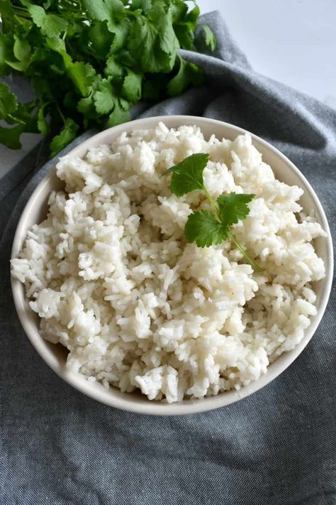 Perfect Fluffy Thai Coconut Rice (Stovetop method) - Hint of Healthy Coconut Garlic Rice, Thai Jasmine Rice Recipes, Coconut Jasmine Rice Recipes, Thai Sweet Rice Recipe, Healthy Coconut Rice, Thai Sweet Rice, Thai Rice Recipes, Thai Side Dishes, Thai Coconut Rice