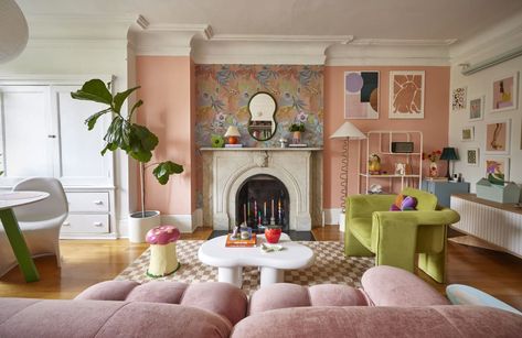 Peach/pink painted art filled living room with a section of floral wallpaper on wall with fireplace. Eclectic Maximalist Bedroom, Maximalist Bedrooms, Boho Barbie, Eclectic Style Decor, Maximalist Interior, Danish Pastel, Maximalist Decor, Interior Aesthetic, Barbie House