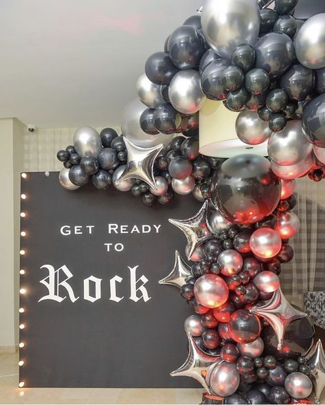 Rock n Roll party balloon arch Rockstar Decorations Party, 80s Rock Band Party Ideas, Rock Birthday Decoration, Rock Music Theme Party, Rock Star Balloon Garland, Rock Through The Ages Party, Glam Rock Birthday Party Ideas, Heavy Metal Birthday Party Decorations, Rock And Roll Gala Theme