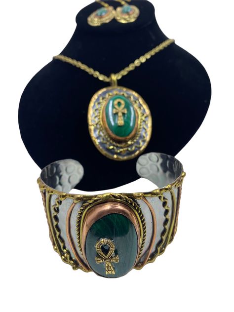 "This stunning jewelry set includes a pair of earrings, a bracelet, and a necklace with an Ankh charm and Malachite gemstone.  The ankh is known as the key of life, the key of the Nile. It represents the concept of eternal life, which is the general meaning of the symbol.  It is said that Malachite is a stone that should not be used for physical healing. Malachite has been called the \"mirror of the soul\". It is variable in its condition. It reaches the inner feelings of the person and reflects Akasha Core, Key Of Life, Physical Healing, Earthy Jewelry, The Nile, Jewelry Earring, Funky Jewelry, Jewelry Lookbook, Eternal Life