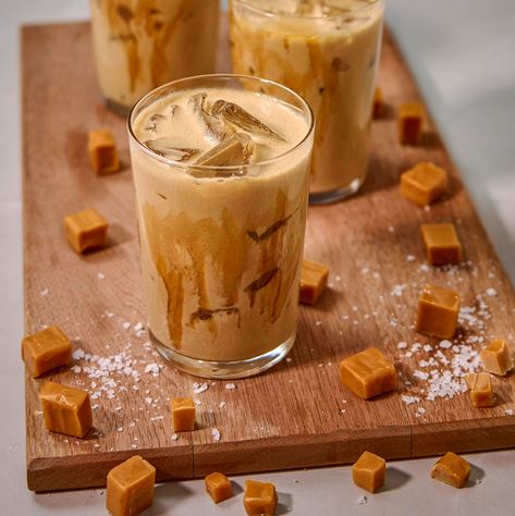 No summer blues when it��’s salty caramel infused! 🤤🧋🧊 Our Salted Caramel Iced Latte is a must-have in your shop, a sweet caramel flavor with a hint of salty goodness. Add this flavor to your shop! Visit ibevconcepts.com/blogs/recipes to learn more about our mix formulas for hot, cold & over ice options. . . . . . . #FrappeFlavors #coffeelover #mocafebarista #CoffeeShop #BaristaLife #mocafeusa #baristadaily #Summerdrink #FrappeLovers #cappuccino #cappuccinos #coffeelover #coffeegram #coffe... Baking Photoshoot, Salted Caramel Latte, Caramel Cappuccino, Salted Caramel Coffee, Trendy Drinks, Salted Caramel Recipes, Salty Caramel, Summer Blues, Caramel Latte