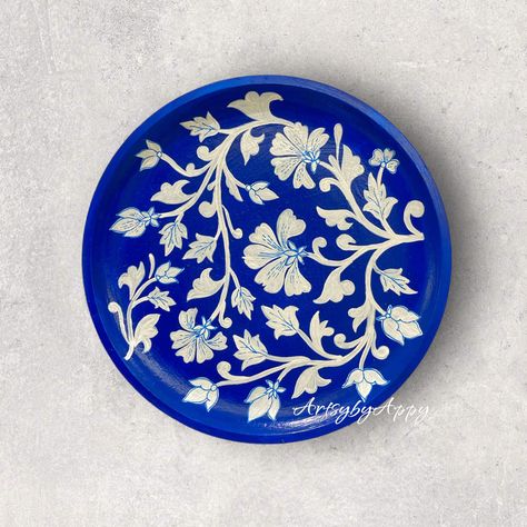 Size - 10 inches Thickness - 8mm This beautifully hand painted wall plate is up for grabs Blue Pottery Designs, Round Pottery, Mughal Art Paintings, Pottery Wall, Pot Painting, Mughal Art, Paintings Wall, Pottery Plate, Decorative Ideas