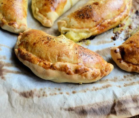 Childhood memories of family picnics and a lovely recipe for cheese and onion pasties. These delicious little pasties are packed with Farmhouse Cheddar cheese, mashed potatoes and onions, and are my MOST requested recipe by all of my family and friends! Potato Pasties, Vegetarian Pasties, Cheese And Onion Pasty, Pasties Recipes, Meat Pies, Irish Food, Savory Pies, Low Fodmap Recipes, Fodmap Recipes