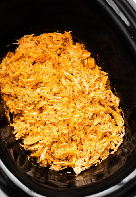 This slow cooker buffalo chicken recipe is super easy to make with only three ingredients! It's perfect for sandwiches, wraps, tacos, salads and so much more. Buffalo Shredded Chicken Crockpot, Buffalo Chicken Crock Pot, Buffalo Chicken Recipes Crockpot, Macro Eating, Buffalo Chicken Recipe, Slow Cooker Buffalo Chicken, Shredded Chicken Crockpot, Shredded Buffalo Chicken, Crockpot Buffalo Chicken