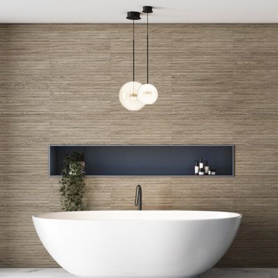 Replicating a wood look, our Woodstrip Ceramic Wall Tile provides decorative appeal that adapts to a variety of stylistic contexts, making it a great choice for your space. With its non-vitreous features, this rectangle tile is an ideal selection for indoor installations, including bathrooms, backsplashes, showers, hallways and fireplace facades. This tile is a perfect choice on its own or paired with other products in the Woodstrip Collection. Tile is the better choice for your space. This tile Wood Look Tile Shower Walls With Tub, Wood Look Tiles In Bathroom, Bathroom With Quartz Countertop, Master Shower Tile Ideas Modern, Flat Panel Bathroom Cabinets, Contemporary Master Suite, Tub Nook Master Bath, Wood Tile Wall Bathroom, Wood Accents In Bathroom