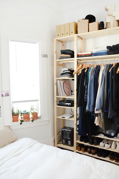 MJ's bedroom lacks a closet as well, so an IKEA IVAR shelving unit holds her clothes, shoes, and accessories. Open Closet Storage, Makeshift Closet, Ivar Regal, Små Rum Lidt Plads, Small Closet Space, Apartment Needs, Ikea Closet, Ikea Ivar, Open Wardrobe