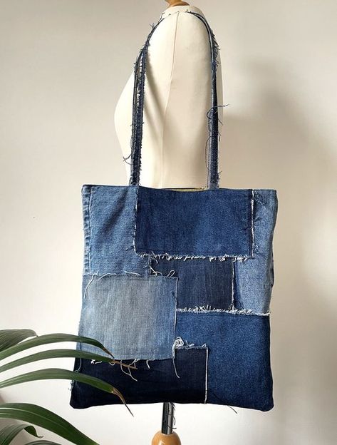 Handmade Reversible Patched Denim Tote Bag #recyclejeans #recyclejeansprojects #recyclejeansbagpattern Bag From Recycled Materials, Jean Patchwork Bag, Denim Patchwork Bag Diy, Recycled Tote Bags, Recycled Bags Diy, Denim Pockets Projects, Denim Patchwork Tote Bag, Upcycled Denim Bag, Upcycled Tote Bags