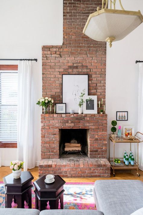 Terrific Free old Brick Fireplace Suggestions A brick fireplace can be quite a gorgeous focal point in an area, but sometimes they are able to hav #Brick #Fireplace #Free #Suggestions #Terrific Hidden Fireplace, Rental Renovation, Red Brick Fireplace, Fireplace Apartment, Small Apartment Decorating Living Room, Red Brick Fireplaces, Chic Chandelier, Minimalist Living Room Decor, Brooklyn Apartment