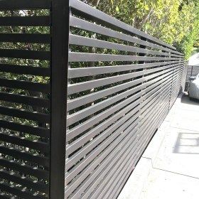 Iron fence with horizontal slats Aluminum Fence Landscaping, Fancy Fence, Horizontal Slat Fence, Property Gates, Iron Fencing, Gates And Fences, Gate Fence, Aluminum Fencing, House Fence Design