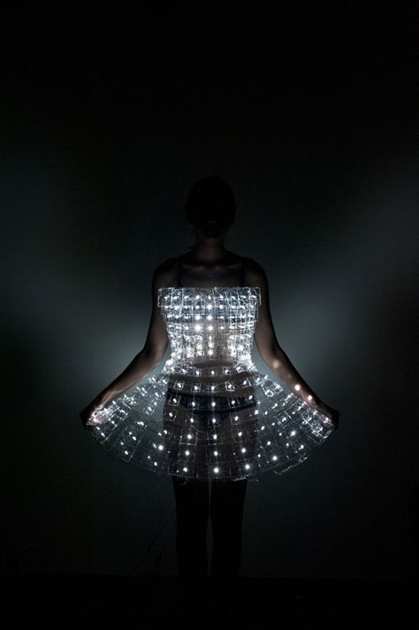 Shiping Toohey ~ "Cinderella Intoxication" (2012) "…interactive art piece bridging sensory technologies with traditional garment design." wearable technology LED | Photos: Jack Bush via Behance Literature Meaning, Light Up Costumes, Smart Textiles, E Textiles, Led Fashion, Led Dress, Technology Fashion, Futuristic Fashion, Wearable Tech