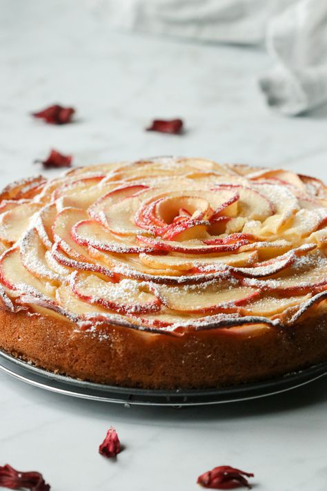 An easy and elegant Apple Rose Cake that is sure to impress your guests. With a moist crumb, speckled with shredded apples and topped with more slices of apples to form an edible rose. #applecake #elegantcake #easycakerecipe Apple Rose Cake, Apple Cake Decoration, Rose Cake Recipe, Caramel Apple Cake Recipe, Healthy Apple Cake, Upside Down Apple Cake, Vegan Apple Cake, Irish Apple Cake, Moist Apple Cake